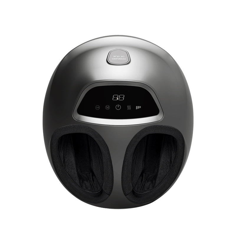 A modern foot massager with a sleek, rounded metallic gray exterior and a digital control panel on the front, set against a solid white background.